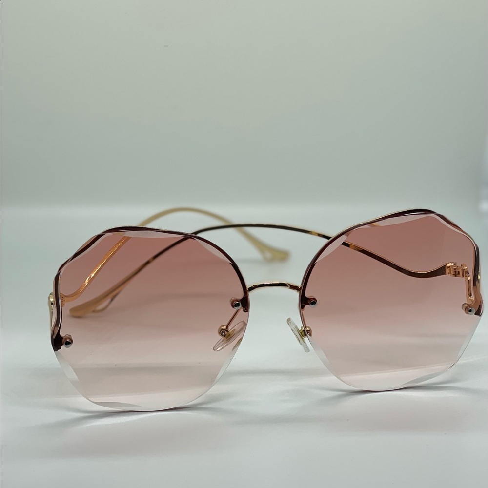 New! Women’s Rimless Sunglasses.